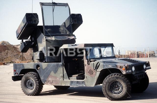 A view of an Avenger air defense system deployed with Btry. A, 2nd Bn., 6th Air Defense Artillery Bde., during Operation Desert Shield. The Avenger consists of a four-tube Stinger anti-aircraft missile launcher mounted on each side of an operator's station on a pedestal carried by an M-998 High-Mobility Multipurpose Wheeled Vehicle (HMMWV). A .50-caliber machine gun can be mounted beneath the right side Stinger launcher. Subject Operation/Series: DESERT SHIELD Country: Saudi Arabia (SAU) A view of an Avenger air defense system deployed with Btry. A, 2nd Bn., 6th Air Defense Artillery Bde., during Operation Desert Shield. The Avenger consists of a four-tube Stinger anti-aircraft missile launcher mounted on each side of an operator's station on a pedestal carried by an M-998 High-Mobility Multipurpose Wheeled Vehicle (HMMWV). A .50-caliber machine gun can be mounted beneath the right side Stinger launcher. Subject Operation/Series: DESERT SHIELD Country: Saudi Arabia (SAU)