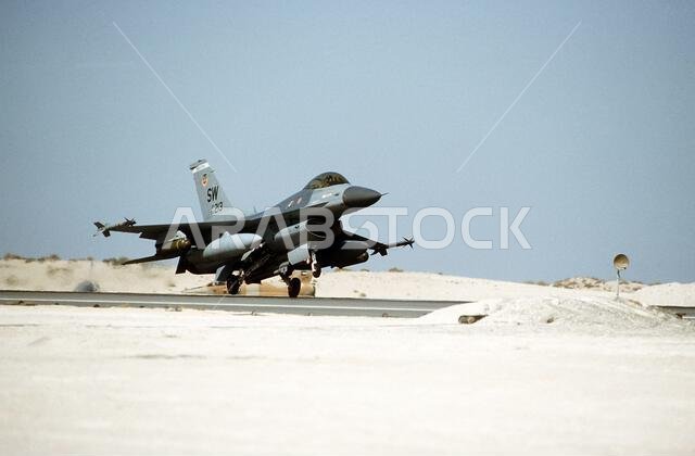 An F-16C Fighting Falcon fighter aircraft of the 363rd Tactical Fighter Wing, Shaw Air Force Base, S.C., takes off for a mission in support of Operation Desert Storm. The aircraft is armed with bombs mounted under the wings, and AIM-9 Sidewinder air-to-air missiles on its wing tips.. Subject Operation/Series: DESERT STORM Country: Saudi Arabia(SAU) An F-16C Fighting Falcon fighter aircraft of the 363rd Tactical Fighter Wing, Shaw Air Force Base, S.C., takes off for a mission in support of Operation Desert Storm. The aircraft is armed with bombs mounted under the wings, and AIM-9 Sidewinder air-to-air missiles on its wing tips.. Subject Operation/Series: DESERT STORM Country: Saudi Arabia(SAU)