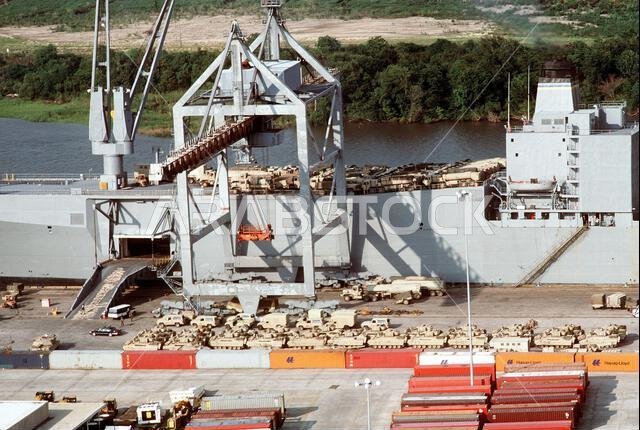 Equipment of the 24th Infantry Division is loaded aboard a rapid-response vehicle cargo ship in preparation for deployment to Saudi Arabia during Operation Desert Shield. Subject Operation/Series: DESERT SHIELD Base: Savannah State: Georgia (GA) Country: United States Of America (USA)