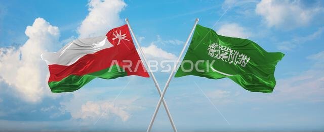 two crossed flags Saudi Arabia and Oman waving in wind at cloudy sky. Concept of relationship, dialog, travelling between two countries. 3d illustrati two crossed flags Saudi Arabia and Oman waving in wind at cloudy sky. Concept of relationship, dialog, travelling between two countries. 3d illustrati