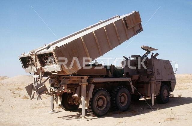 A Brazilian-made Avibras ASTROS-II SS-30 multiple rocket systems on Tectran 6x6 AV-LMU trucks stand in firing position while being displayed as part of a demonstration of Saudi Arabian equipment during Operation Desert Shield.. Subject Operation/Series: DESERT SHIELD Country: Saudi Arabia(SAU) A Brazilian-made Avibras ASTROS-II SS-30 multiple rocket systems on Tectran 6x6 AV-LMU trucks stand in firing position while being displayed as part of a demonstration of Saudi Arabian equipment during Operation Desert Shield.. Subject Operation/Series: DESERT SHIELD Country: Saudi Arabia(SAU)