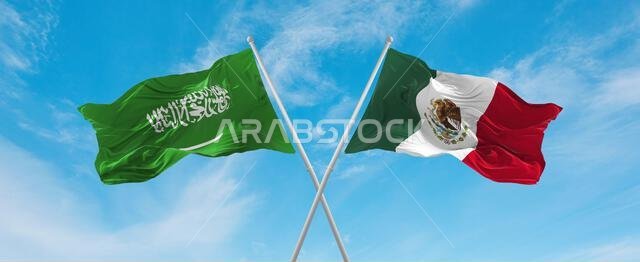 علمان متقاطعان، علم المكسيك وعلم السعودية، يرفرفان في مهب الريح تحت سماء ملبدة بالغيوم. يرمز هذا إلى مفهوم العلاقة والحوار والسفر بين البلدين. رسم توضيحي ثلاثي الأبعاد.