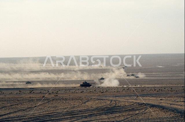Tanks from the 20th Armored Brigade, Royal Saudi Land Force, participate in a capabilities demonstration for visiting dignitaries during Operation Desert Shield.. Subject Operation/Series: DESERT SHEILD Country: Saudi Arabia(SAU)