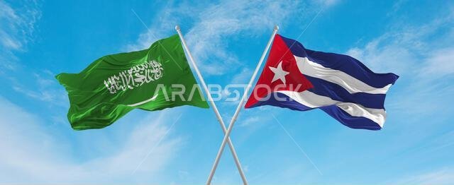 two crossed flags Cuba and Saudi Arabia waving in wind at cloudy sky. Concept of relationship, dialog, travelling between two countries. 3d illustrati
