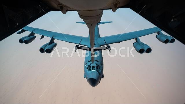 A U.S. Air Force B-52H Stratofortress approaches a U.S. Air Force KC-10 Extender assigned to the 908th Expeditionary Air Refueling Squadron to conduct aerial refueling above the Kingdom of Saudi Arabia, March 29, 2022. The presence of the B-52H showcases U.S. Central Command's ability to deliver combat airpower at a moment’s notice, as well as its commitment to partners and regional security. A U.S. Air Force B-52H Stratofortress approaches a U.S. Air Force KC-10 Extender assigned to the 908th Expeditionary Air Refueling Squadron to conduct aerial refueling above the Kingdom of Saudi Arabia, March 29, 2022. The presence of the B-52H showcases U.S. Central Command's ability to deliver combat airpower at a moment’s notice, as well as its commitment to partners and regional security.