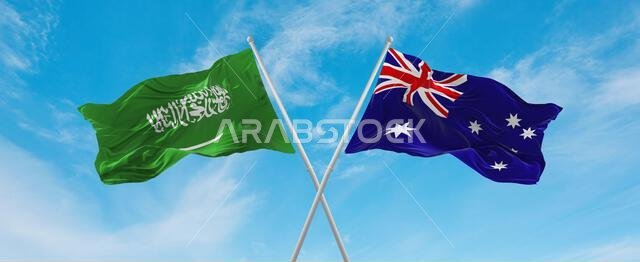 two crossed flags Australia and Saudi Arabia waving in wind at cloudy sky. Concept of relationship, dialog, travelling between two countries. 3d illus