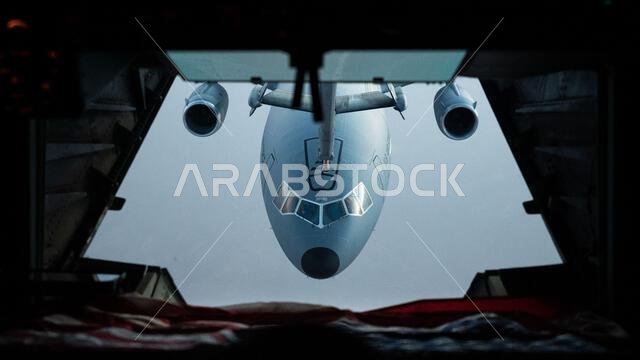 A U.S. Air Force KC-10 Extender connects to another KC-10 for aerial refueling over the U.S. Central Command area of responsibility, April 7, 2022. The KC-10 is an advanced tanker and cargo aircraft designed to provide increased global mobility for U.S. armed forces. 305th AMW,305th air mobility wing,378th AEW,378th Air Expeditionary Wing,908th EARS,908th Expeditionary Air Refueling Squadron,KC-10,KC-10 Extender,KSA,Kingdom of Saudi Arabia,MCGUIRE AFB,McGuire Air Force Base,PSAB,Prince Sultan Ai