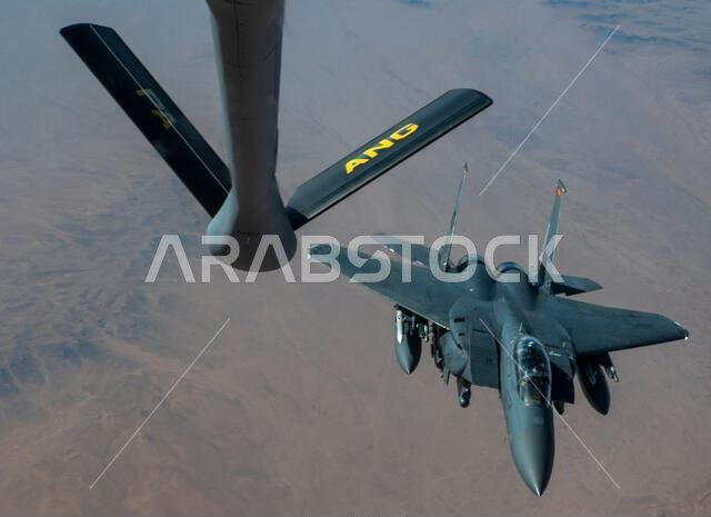 Undisclosed Location, Qatar. 30 December, 2022. A U.S. Air Force F-15 Strike Eagle fighter aircraft breaks off after after refueling from a KC-135 Stratotanker aircraft over U.S. Central Command area of responsibility, December 30, 2022 over Qatar. Credit: SSgt. Kirby Turbak/U.S. Air Force/Alamy Live News