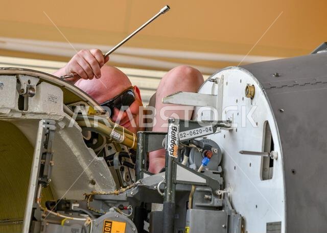 A U.S. Air Force avionics technician, assigned to the 179th Expeditionary Fighter Squadron, repairs a fire control component on a Block 50 F-16CM Fighting Falcon at Prince Sultan Air Base, Kingdom of Saudi Arabia, April 24, 2022. Avionics technicians inspect, maintain and repair systems responsible for communication, navigation, target acquisition and more. The 179th EFS projects combat airpower across AFCENT’s area of responsibility, supporting personnel, improving force movement, and showing U