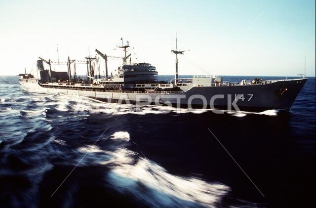 A starboard view of the fleet oiler USNS TRUCKEE (T-AO-147) with a fuel line extended to the rapid-response vehicle cargo ship USNS REGULUS (T-AKR-292). The TRUCKEE is conducting underway replenishment operations with the REGULUS, which is transporting equipment to Saudi Arabia in support of Operation Desert Shield. Subject Operation/Series: DESERT SHIELD Country: Unknown A starboard view of the fleet oiler USNS TRUCKEE (T-AO-147) with a fuel line extended to the rapid-response vehicle cargo ship USNS REGULUS (T-AKR-292). The TRUCKEE is conducting underway replenishment operations with the REGULUS, which is transporting equipment to Saudi Arabia in support of Operation Desert Shield. Subject Operation/Series: DESERT SHIELD Country: Unknown