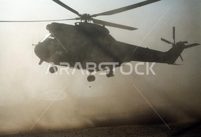An SA.330 Puma helicopter of the French army lifts off in a cloud of sand during Operation Desert Shield.. Subject Operation/Series: DESERT SHIELD Country: Saudi Arabia(SAU)