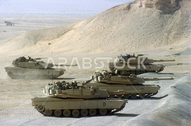 M-1A1 Abrams main battle tanks of Co. A, 3rd Bn., 32nd Armored Regt., 1ST Cav. Div., test their guns prior to taking part in an exercise during Operation Desert Shield. Subject Operation/Series: DESERT SHIELD Country: Saudi Arabia(SAU) M-1A1 Abrams main battle tanks of Co. A, 3rd Bn., 32nd Armored Regt., 1ST Cav. Div., test their guns prior to taking part in an exercise during Operation Desert Shield. Subject Operation/Series: DESERT SHIELD Country: Saudi Arabia(SAU)