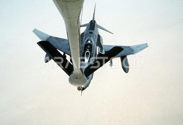 A 35th Tactical Fighter Wing F-4G Phantom II aircraft approaches the refueling boom of a KC-135 Stratotanker aircraft while on a training flight during Operation Desert Shield. Subject Operation/Series: DESERT SHIELD Country: Saudi Arabia (SAU) A 35th Tactical Fighter Wing F-4G Phantom II aircraft approaches the refueling boom of a KC-135 Stratotanker aircraft while on a training flight during Operation Desert Shield. Subject Operation/Series: DESERT SHIELD Country: Saudi Arabia (SAU)