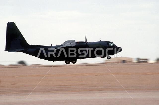 An Air Force Reserve C-130 Hercules aircraft comes in for a landing during Operation Desert Shield. Subject Operation/Series: DESERT SHIELD Country: Saudi Arabia (SAU)