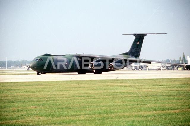 A 90th Military Airlift Wing C-141B Starlifter aircraft taxis on the runway as it prepares to deploy to Saudi Arabia during Operation Desert Shield. Subject Operation/Series: DESERT SHIELD Base: Pope Air Force Base State: North Carolina (NC) Country: United States Of America (USA) A 90th Military Airlift Wing C-141B Starlifter aircraft taxis on the runway as it prepares to deploy to Saudi Arabia during Operation Desert Shield. Subject Operation/Series: DESERT SHIELD Base: Pope Air Force Base State: North Carolina (NC) Country: United States Of America (USA)