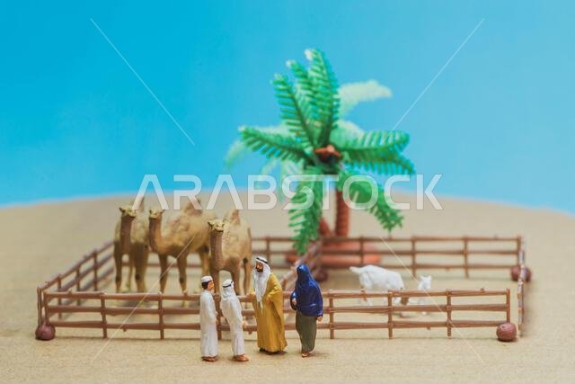 Miniature toy Arab man and wife in abaya buys camel and sheep from a kid on a farm concept. Miniature toy Arab man and wife in abaya buys camel and sheep from a kid on a farm concept.