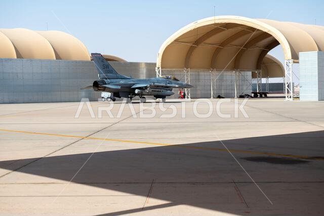 An F-16 Fighting Falcon aircraft assigned to the 77th Expeditionary Fighter Squadron, prepares to park in an overhang, at Prince Sultan Air Base, Kingdom of Saudi Arabia, Nov. 14, 2022. Known as the "Gamblers" the 77th EFS plays a key role in the 378th Air Expeditionary Wing's mission to project combat air power in partnership with the Kingdom of Saudi Arabia to deter Iran, compete strategically and counter violent extremist organizations. (U.S. Air Force photo by Staff Sgt. Shannon Bowman)