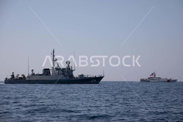 220920-A-JJ498-1143 ARABIAN GULF (Sept. 20, 2022) Royal Saudi Navy ship HMS As-Siddiq (PGG 511) sails with U.S. Coast Guard fast response cutter USCGC Charles Moulthrope (WPC 1141) in the Arabian Gulf, Sept. 20, during the International Maritime Security Construct (IMSC) exercise Sentinel Shield. Sentinel Shield is a monthly exercise series conducted by IMSC to enhance communication and coordination among partner naval forces. Arabian Gulf,IMSC,International Maritime Security Construct,Saudi Ara