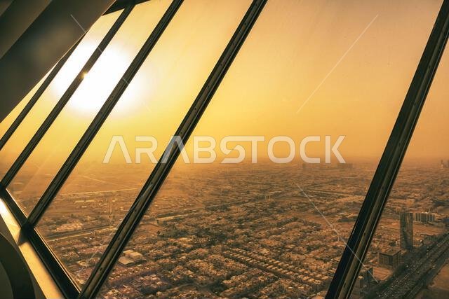 View from the Sky Bridge observation deck in the Kingdom Centre tower in Riyadh Saudi Arabia at sunset. View from the Sky Bridge observation deck in the Kingdom Centre tower in Riyadh Saudi Arabia at sunset.