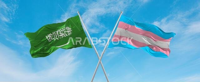 يرفرف علمان متقاطعان، علم فخر المتحولين جنسياً وعلم المملكة العربية السعودية، في مهب الريح تحت سماء ملبدة بالغيوم. يرمز هذا إلى مفهوم العلاقة والحوار والسفر بين البلدين.