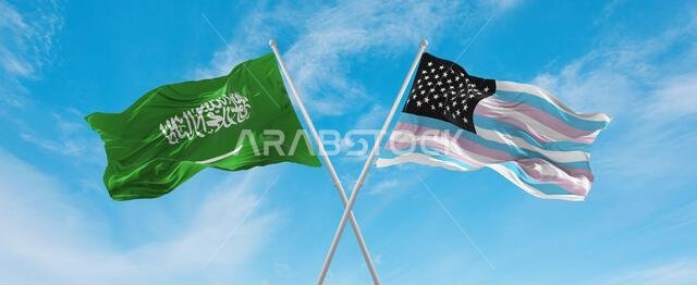 two crossed flags TransAmerica and Saudi Arabia waving in wind at cloudy sky. Concept of relationship, dialog, travelling between two countries. 3d il two crossed flags TransAmerica and Saudi Arabia waving in wind at cloudy sky. Concept of relationship, dialog, travelling between two countries. 3d il