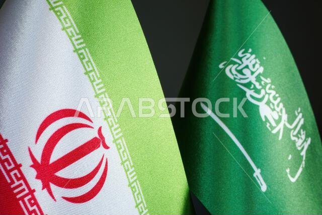 Close-up of the flags of Iran and Saudi Arabia.