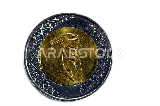 Obverse side of 2 SAR two Saudi Arabia riyals coin series 1438 AH 2016 features portrait of king AbdulAziz Bin AbdulRahman Al Saud the founder of dyna Obverse side of 2 SAR two Saudi Arabia riyals coin series 1438 AH 2016 features portrait of king AbdulAziz Bin AbdulRahman Al Saud the founder of dyna