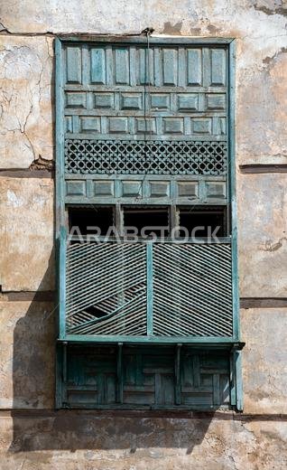 Unrestored traditional green wooden balcony Al Balad Jeddah Saudi Arabia