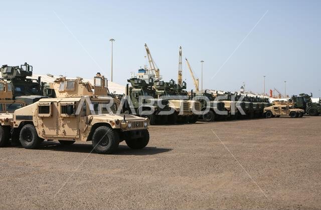 U.S. Marines with Combat Logistics Regiment 1, 1st Marine Logistics Group, stage vehicles in preparation for ship on-load during exercise Native Fury 22 at Yanbu Commercial Port, Kingdom of Saudi Arabia, Aug. 24, 2022. The Kingdom of Saudi Arabia enables the U.S. Marine Corps Central Command and U.S. Central Command to receive and employ forces and resources rapidly in the region through a growing network of western geographic access and staging points. (U.S. Marine Corps photo by Sgt. Alize Sot