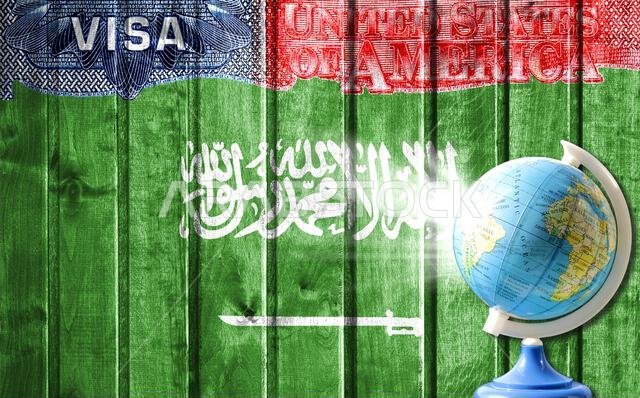 United States of America visa document, flag of Saudi Arabia and globe in the background. The concept of travel to the United States and illegal migra