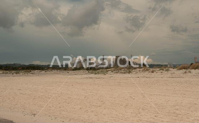 Riomaggiore, Italy - June 8. 2021: Solvay Chemical plant seen from Spiaggie Bianche Beach at Mediterranean Sea