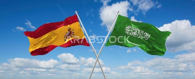 two crossed flags Saudi Arabia and spain waving in wind at cloudy sky. Concept of relationship, dialog, travelling between two countries. 3d illustrat two crossed flags Saudi Arabia and spain waving in wind at cloudy sky. Concept of relationship, dialog, travelling between two countries. 3d illustrat