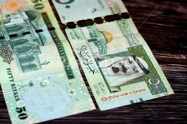 Saudi Arabia 50 SAR fifty Saudi riyals cash money banknote with the photo of king Abdullah Bin AbdulAziz and the Dome of the Rock and Al Aqsa mosque i