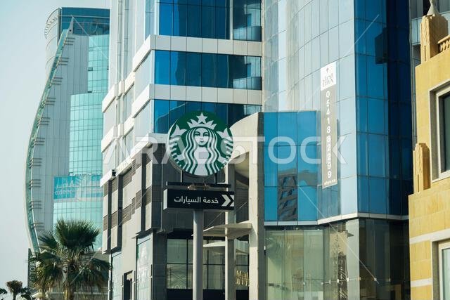 Arabic Starbuck drive-thru sign, Starbucks sign downtown. Arabic Starbuck drive-thru sign, Starbucks sign downtown.