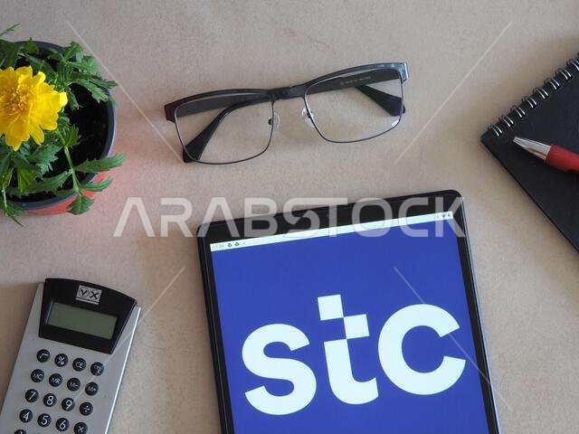 In this photo illustration, Saudi Telecom Company (STC) logo seen displayed on a tablet In this photo illustration, Saudi Telecom Company (STC) logo seen displayed on a tablet