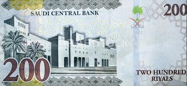 Large fragment of the reverse side of 200 two hundred Saudi riyals banknote features the Qasr Al Hukm in Riyadh City, selective focus of Saudi Arabia