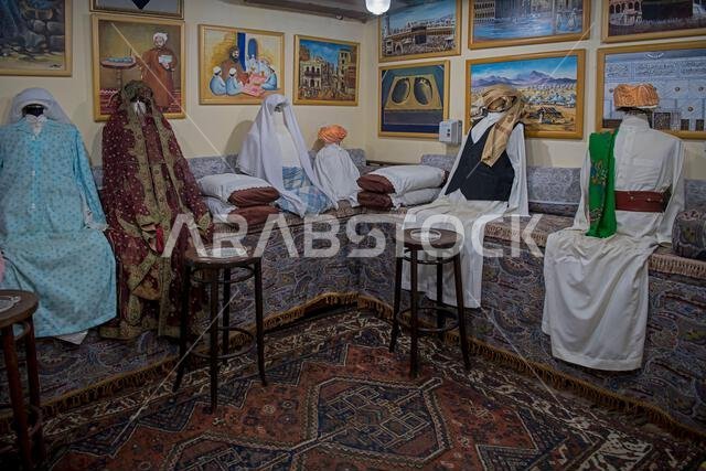 Typical interior room with models made out of textilles  and showing traditional furnishings from each province in Saudi Al Tayebat museum Jeddah Saudi Arabia