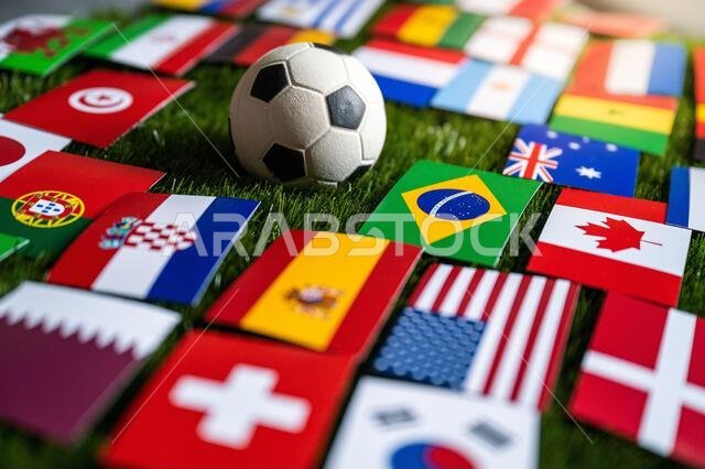 Football Ball and Flags of all 32 Countries which will play in Qatar. Soccer wallpaper