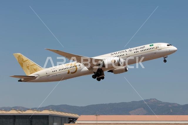 A Saudi Arabian Airlines Boeing 787-9 Dreamliner leaving Malaga Costa del Sol airport.Saudia, formerly known as Saudi Arabian Airlines, is the flag carrier of Saudi Arabia, based in Jeddah.