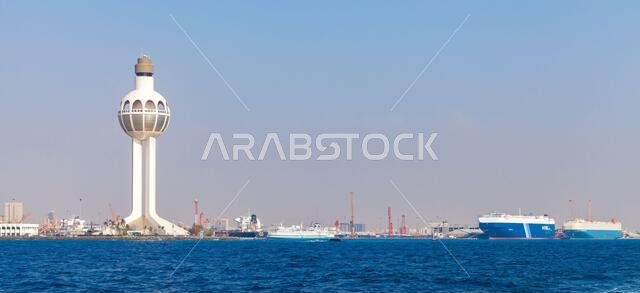 Jeddah, Saudi Arabia - December 22, 2019: Skyline of Jeddah port with white traffic control tower, seaside view