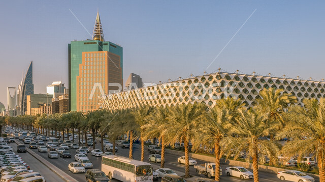 صورة إبداعية لمدينة الرياض ، الأبراج وناطحات السحاب ، الفن الهندسي المعماري بالسعودية، معالم سياحية مشهورة بالرياض في المملكة العربية السعودية، طريق الملك فهد في الرياض، حركة سير السيارات على الطريق العام، مكتبة الملك فهد