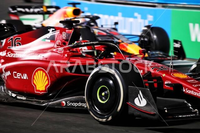 Jeddah, Saudi Arabia. 27th Mar, 2022. Charles Leclerc (MON) Ferrari F1-75 and Max Verstappen (NLD) Red Bull Racing RB18 battle for the lead of the race. Saudi Arabian Grand Prix, Sunday 27th March 2022. Jeddah, Saudi Arabia. Credit: James Moy/Alamy Live News Jeddah, Saudi Arabia. 27th Mar, 2022. Charles Leclerc (MON) Ferrari F1-75 and Max Verstappen (NLD) Red Bull Racing RB18 battle for the lead of the race. Saudi Arabian Grand Prix, Sunday 27th March 2022. Jeddah, Saudi Arabia. Credit: James Moy/Alamy Live News