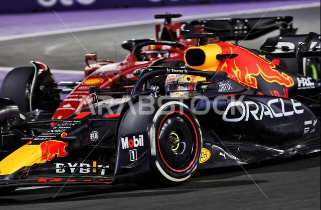 Jeddah, Saudi Arabia. 27th Mar, 2022. Max Verstappen (NLD) Red Bull Racing RB18 leads Charles Leclerc (MON) Ferrari F1-75. 27.03.2022. Formula 1 World Championship, Rd 2, Saudi Arabian Grand Prix, Jeddah, Saudi Arabia, Race Day. Photo credit should read: XPB/Press Association Images. Credit: XPB Images Ltd/Alamy Live News