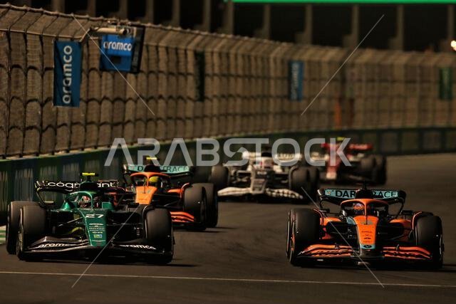 Jeddah, Saudi Arabia. 27th Mar, 2022. Nico Hulkenberg (GER) Aston Martin F1 Team Reserve Driver AMR22 and Daniel Ricciardo (AUS) McLaren MCL36. Saudi Arabian Grand Prix, Sunday 27th March 2022. Jeddah, Saudi Arabia. Credit: James Moy/Alamy Live News