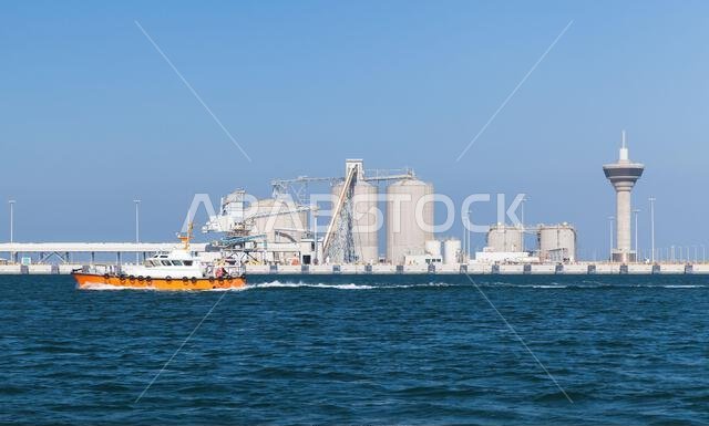 Ras Al Khair port view, Saudi Arabia. Pilot boat is on the way