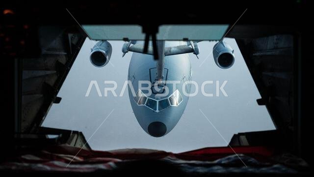 A U.S. Air Force KC-10 Extender connects to another KC-10 for aerial refueling over the U.S. Central Command area of responsibility, April 7, 2022. The KC-10 is an advanced tanker and cargo aircraft designed to provide increased global mobility for U.S. armed forces. (U.S. Air Force photo by Senior Airman Jacob B. Wrightsman)