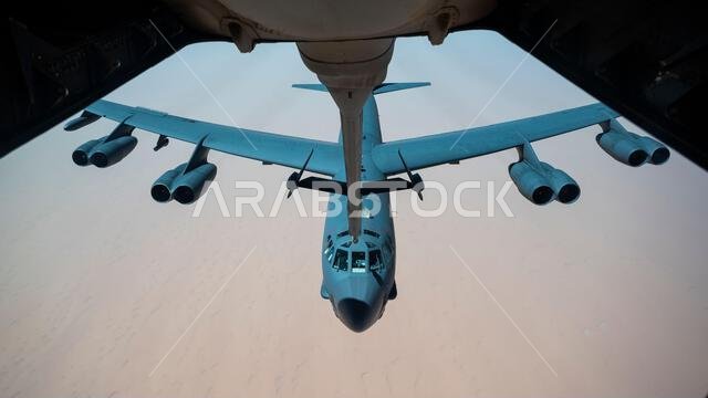 A U.S. Air Force B-52H Stratofortress approaches a U.S. Air Force KC-10 Extender assigned to the 908th Expeditionary Air Refueling Squadron to conduct aerial refueling above the Kingdom of Saudi Arabia, March 29, 2022. The presence of the B-52H showcases U.S. Central Command's ability to deliver combat airpower at a moment’s notice, as well as its commitment to partners and regional security. (U.S. Air Force photo by Staff Sgt. Joseph Pick)