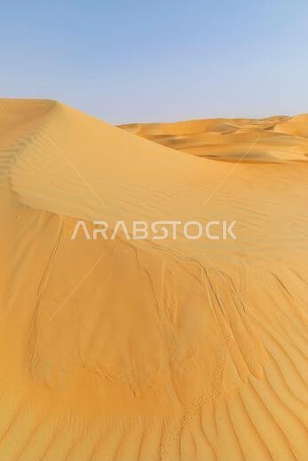 Dunes and colored sands of the Rub al-Khali desert