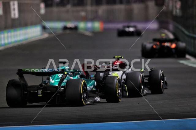 Lance Stroll (CDN) Aston Martin F1 Team AMR22 and Lewis Hamilton (GBR) Mercedes AMG F1 W13 battle for position. Saudi Arabian Grand Prix, Sunday 27th March 2022. Jeddah, Saudi Arabia. Lance Stroll (CDN) Aston Martin F1 Team AMR22 and Lewis Hamilton (GBR) Mercedes AMG F1 W13 battle for position. Saudi Arabian Grand Prix, Sunday 27th March 2022. Jeddah, Saudi Arabia.