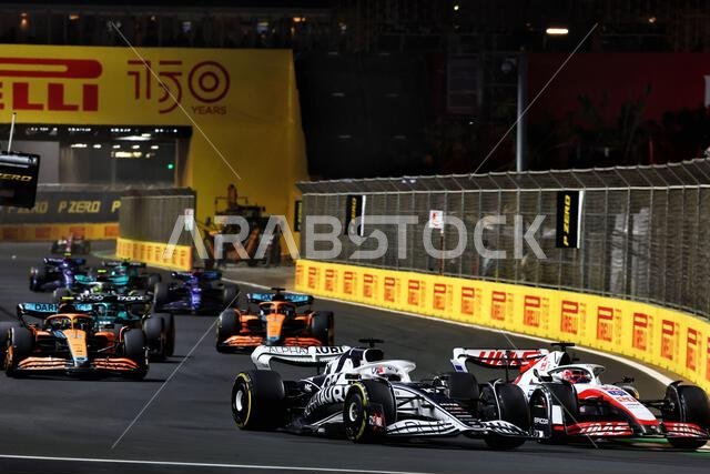 Pierre Gasly (FRA) AlphaTauri AT03 and Kevin Magnussen (DEN) Haas VF-22 at the start of the race. 27.03.2022. Formula 1 World Championship, Rd 2, Saudi Arabian Grand Prix, Jeddah, Saudi Arabia, Race Day.  Photo credit should read: XPB/Press Association Images.